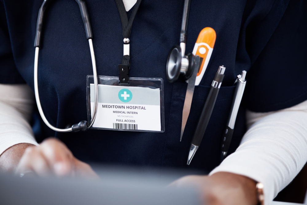 Medical staff member wearing an ID badge for hospital security and access control
